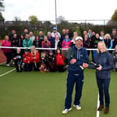 Montrose Tennis Club president Wendy Sanger congratulates Graeme Walker on his development coach of the year award from Tennis Scotland as club members gathered to celebrate that honour and Montrose’s club of the year award. Pic by Neil Werninck