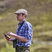 Arthur Fernie, Head Gamekeeper on Mar Estate monitoring waders. (Photo Ed Smith)