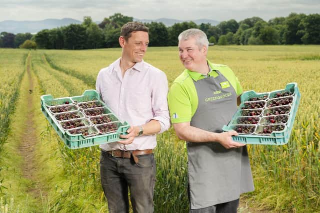 Rowan Marshall, Owner and Grower at Marshall Farms and Asda Produce Colleague Martin Ferguson