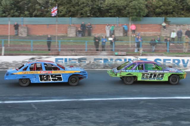 Barry Russell, right, was given a lap of honour before the meeting started