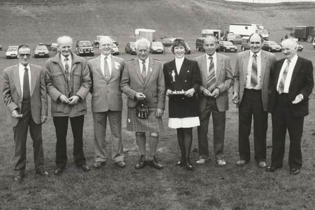 Long service awards were presented at the Angus Show in 1995. From left - Andrew Smith, 30 years, Panlathy; William Campbell, 31 years, Dalziel Farm, Forfar; William Grant, vice-president; William Peebles, 46 years, Simprim Farm, Meigle; Doreen Stout, secretary; Frank Murray, 36 years, Usan Estate; Daniel Blacklaw, 40 years, East Hillhead, Monikie; and William Cameron, 30 years, Kirkton Farm, Monikie.