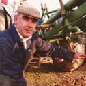 ​At the time this picture was taken in February, 1994, Brian Ogilvy was the Letham local bobby. Brian was also a huge tractor enthusiast, and the picture was taken at the Forfar and District Ploughing competition at Mains of Glasswell, Kirriemuir. Brian's tractor was a 1953 Fordson Major. He won all the competitions in the 11/12-inch class, except feering. His plough was about the same age as the tractor.