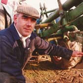 ​At the time this picture was taken in February, 1994, Brian Ogilvy was the Letham local bobby. Brian was also a huge tractor enthusiast, and the picture was taken at the Forfar and District Ploughing competition at Mains of Glasswell, Kirriemuir. Brian's tractor was a 1953 Fordson Major. He won all the competitions in the 11/12-inch class, except feering. His plough was about the same age as the tractor.