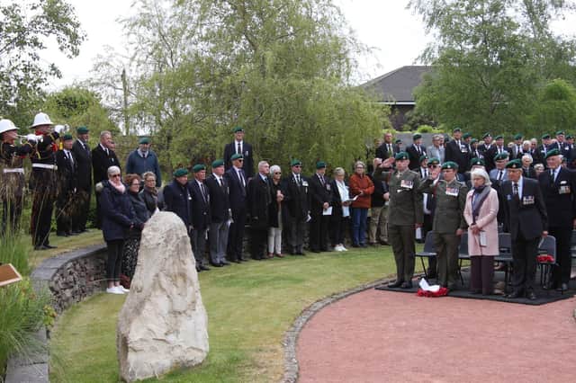 The buglers playing ‘The Last Post’ as veterans and dignitaries attend the memorial service. (Wallace Ferrier)