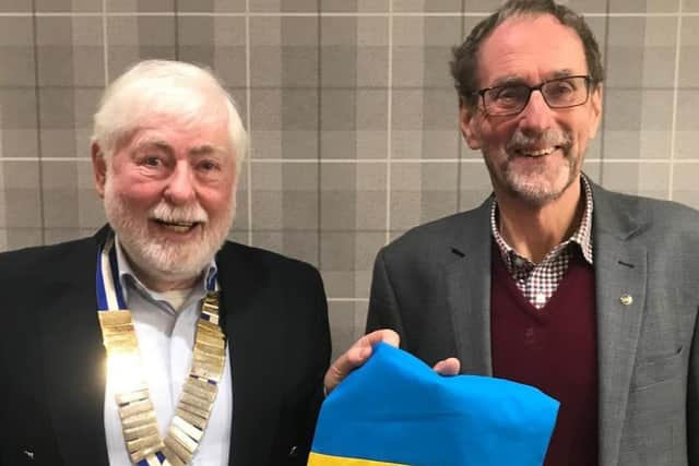 ​Tony Walker is pictured with Probus Club president Bruce Currie.