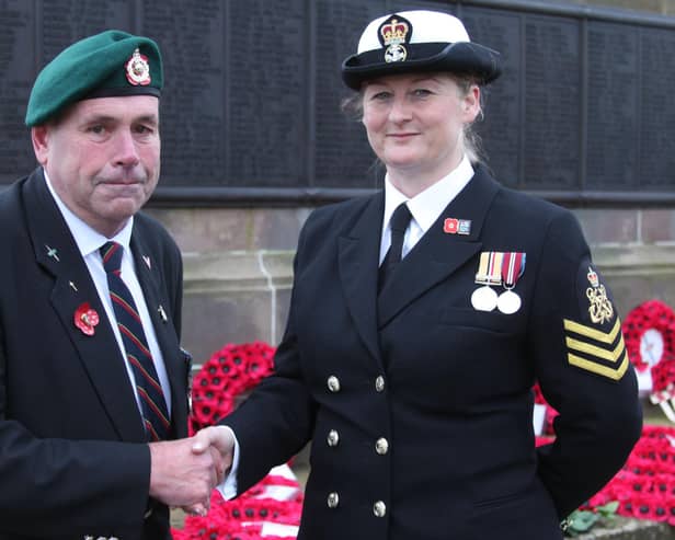 Jeff Smart is pictured congratulating Clair Smart on her appointment as RMA bugler. (Wallace Ferrier)