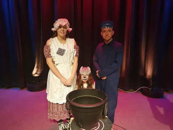 Pictured are cast members Emma Smith as Cinderella, Amy McGruer as Jaq and Steven Dunbar as Buttons.
