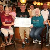 Some of the pub’s customers are pictured wtih Eileen Ramsay, Jim Ramsay and Donna Bow from Reach Across. (Wallace Ferrier)
