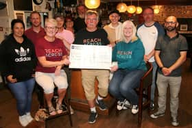 Some of the pub’s customers are pictured wtih Eileen Ramsay, Jim Ramsay and Donna Bow from Reach Across. (Wallace Ferrier)