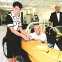 ​In September, 2001 Mackie Motors director Janie Mackie took a 'taste drive' with TV chef Simon Rimmer at the dealership's 'Renault Gastronomique' event, watched by event compere Kevin Smith (bow tie) and Mackie Motors' dealer principal, Kevin Mackie.