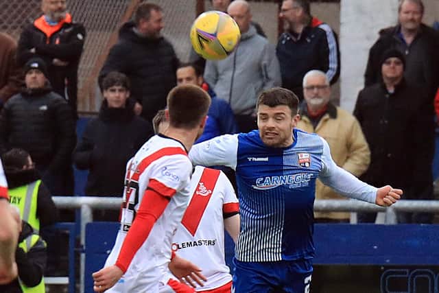Cammy Ballantyne clears his lines. Pic by Phoenix Photography