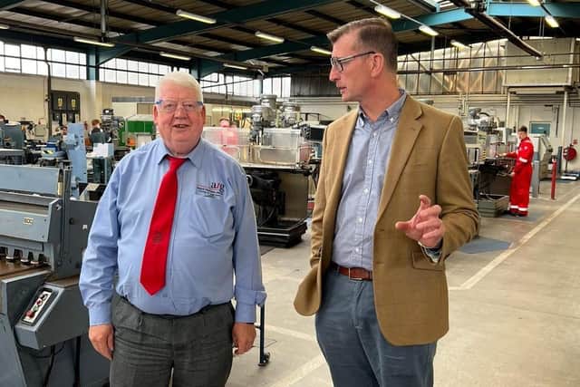 Angus MP Dave Doogan (right) is pictured with Gary Talbot, Angus Training Group managing director.