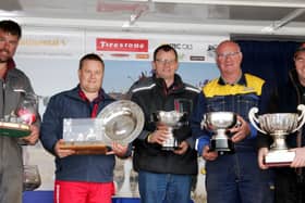 Brian Baxter, centre, pictured with fellow winners at the The 70th British National Ploughing Championships.