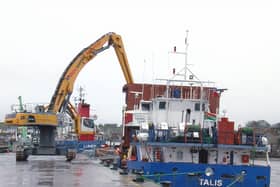 Cargo being discharged from the Vanuatu-flag coaster Talis at Montrose.