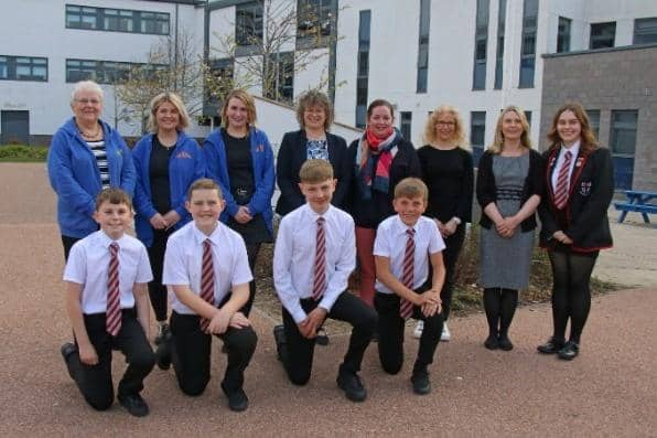 The winning team of Ewan Arthur, Blair Cargill, Harry Edwards, Nathan Miller with members The Attic staff and the judging panel.