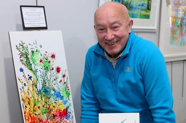 David McGregor with his artwork.