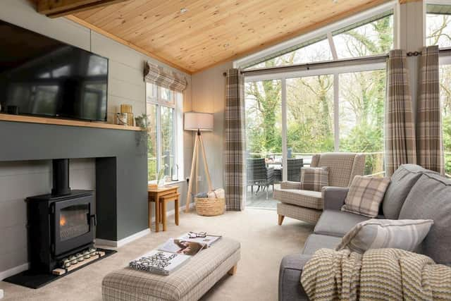 The six person Argel Spa Lodge with exposed beam feature ceiling.