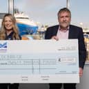 ​Laura Forsyth accepts the £20,000 cheque from Montrose Port Authority CEO Tom Hutchison. (Pic: Jonathan Addie)