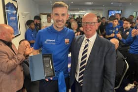 ​Graham Webster is presented with his trophy by Montrose chairman John Crawford (pic: MFC)