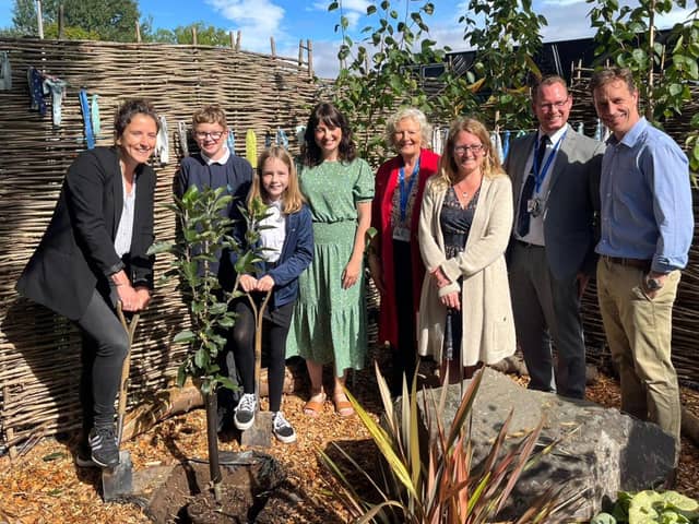​Cabinet Secretary Mari Gougeon plants a tree donated by Ashbrook Nursery at inverbrothock Primary School in Arbroath.