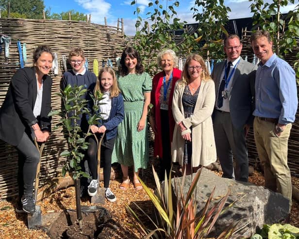 ​Cabinet Secretary Mari Gougeon plants a tree donated by Ashbrook Nursery at inverbrothock Primary School in Arbroath.