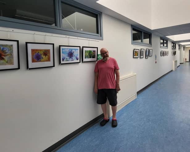 ​Ian Bain with some of his work, which is being exhibited at Whitehills Community Hospital.