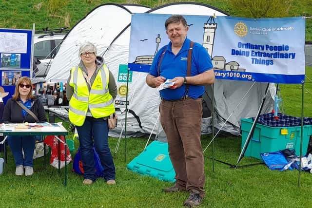 Rotarians are pictured with a ShelterBox and tent on their stand at last year’s Farmers' Market in Victoria Park.