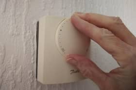 Turning the thermostat down a couple of degrees could make a difference.