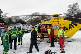 The "highly dramatic" multi-agency rescue was launched on Friday to free a landworker who had become trapped under the root plate of a large tree. The man is now recovering at home.