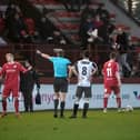 Max Kucheriavyi is sent for an early bath during Monday's match. Pic by Graeme Youngson