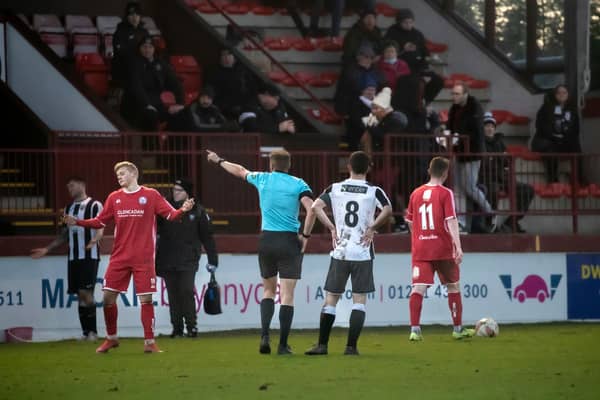 Max Kucheriavyi is sent for an early bath during Monday's match. Pic by Graeme Youngson