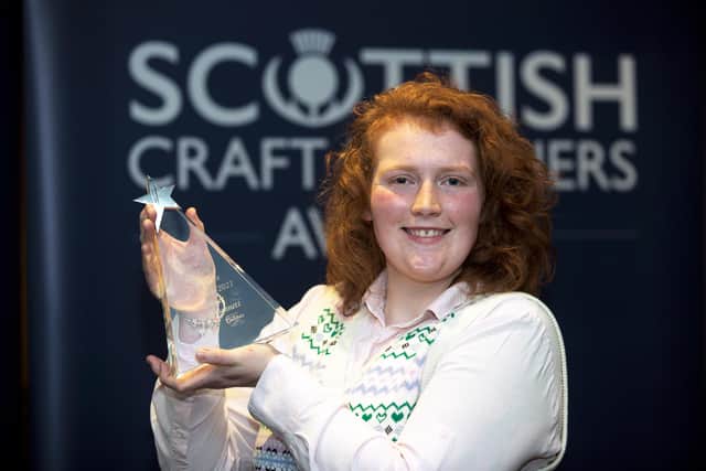 Ariane is pictured with her award.