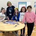 The Angus Engineering initiative recently visited Muirfield Primary School in Arbroath. Picutred are some of the ​P5 pupils who took part, with Rachel Gordon from Dundee Science Centre.