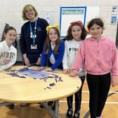 The Angus Engineering initiative recently visited Muirfield Primary School in Arbroath. Picutred are some of the ​P5 pupils who took part, with Rachel Gordon from Dundee Science Centre.