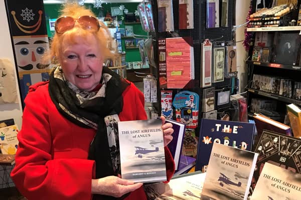 Margaret Bowman is pictured with her new book, ‘The Lost Airfields of Angus’, on display at The Bookhouse in Broughty Ferry.