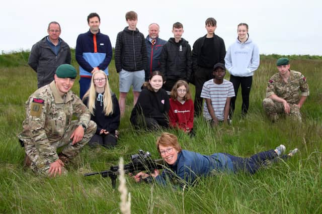 ​Lord-lieutenant Patricia Sawers joined pupils to try her hand, and eye, on the firing range. (Wallace Ferrier)
