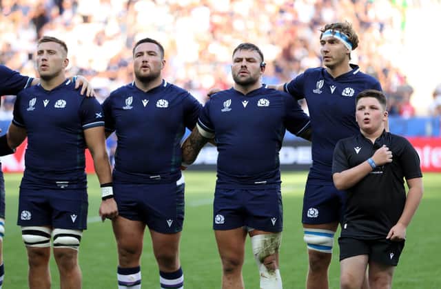 A proud moment for Saul Fenemore as he joins the team on the pitch.