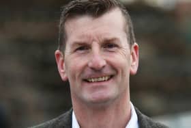 Dave Doogan has called on the Royal Mail to stop the threat of job cuts