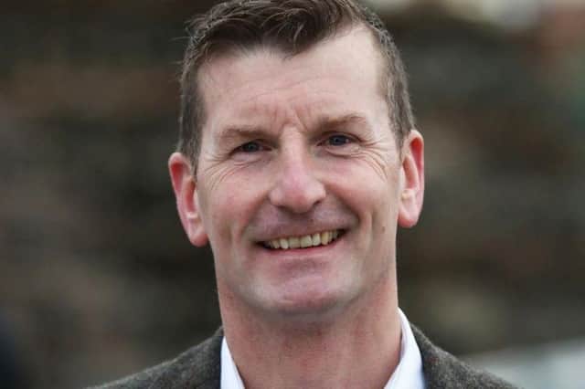 Dave Doogan has called on the Royal Mail to stop the threat of job cuts
