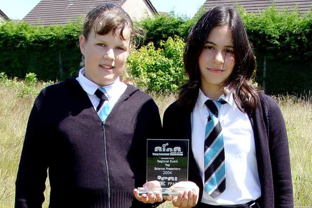 Monifieth High S2 pupils L-R; Fiona Thompson and Rachel Wigderowitz with their winners trophy from the Express Yourself  Young Scientists' Conference.  They won the Award to the Regional Event Top Science Presenters 2004
