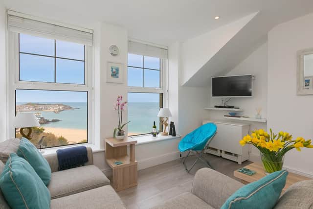 Watch St Ives wake and dazzle by moonlight from the comfort of your apartment, Trevose. Picture - Kiss Photography.