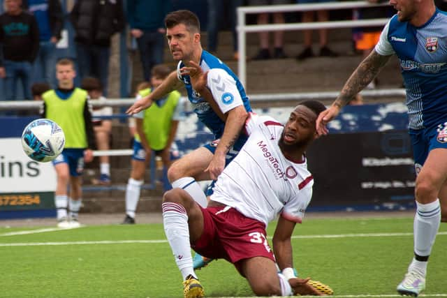 Terry Masson is in the thick of the action during his testimonial