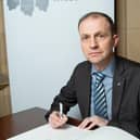 ​Stephen Gethins is pictured signing the Book of Commitment.