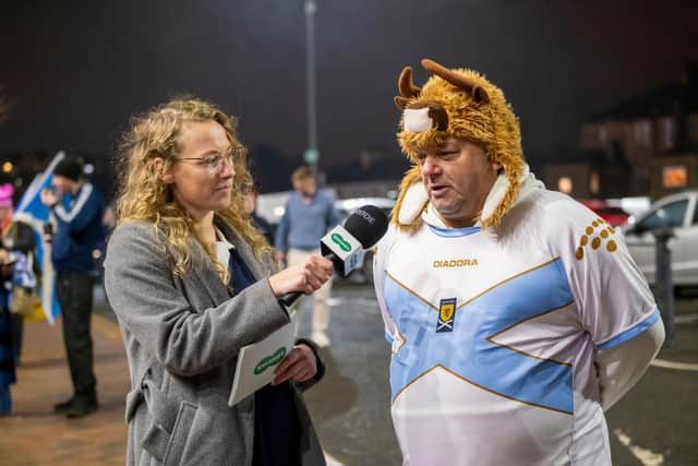 Presenter Beth Wallace and Scotland fan John O'Neil.