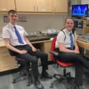 Presenters ​Eva Hutcheon, S3, and Lewis Fyfe S6, at the sound desks.