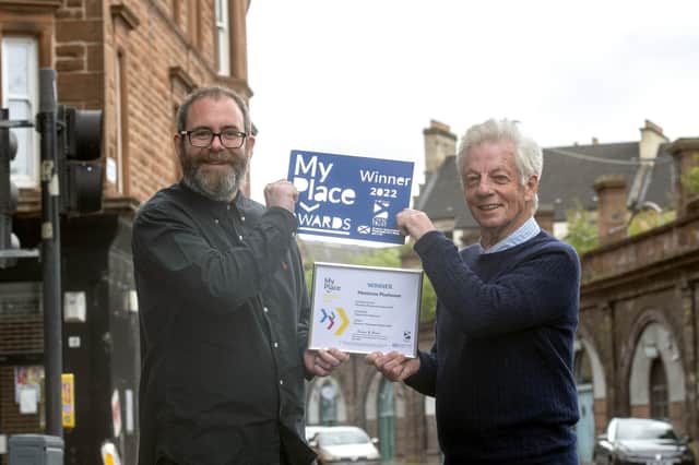 Playhouse manager Matt Buchanan (left) and David May are pictured with the My Place Award.