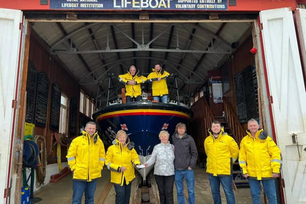 Shirley and Michael Murison are pictured presenting the cheque to Mo Morrison, president of Arbroath Lifeboat Guild. (RNLI/Rod McLean)