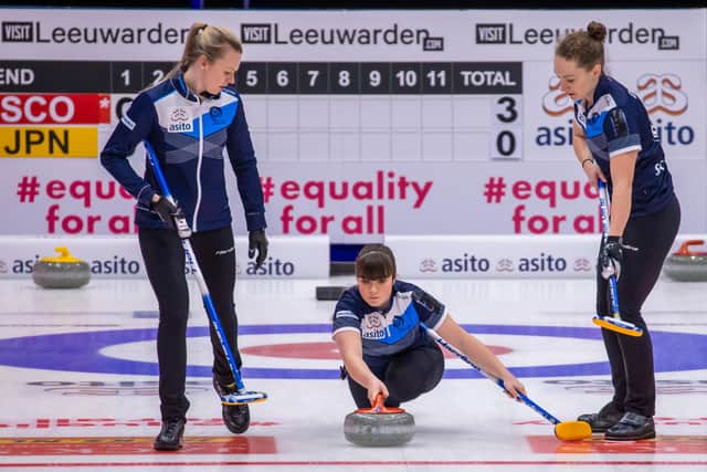Hailey Duff delivers her stone at this week's Olympic qualification event in Leeuwarden, guided on the left by Forfar's Vicky Wright. Pic by WCF / Steve Seixeiro