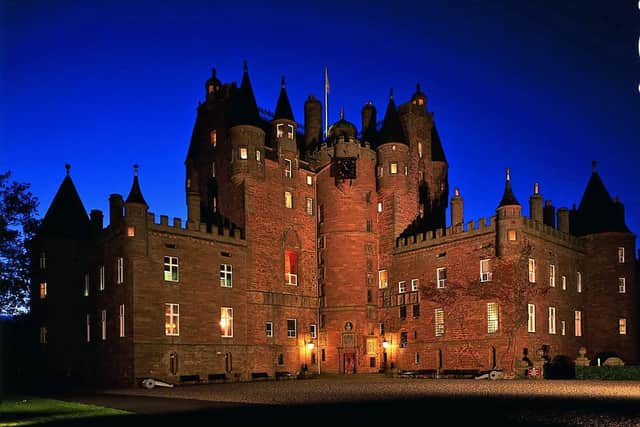 Atmospheric... Glamis Castle by night.