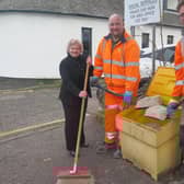 Dianne Alexander with road crew members David Scott and Allan Cleary.